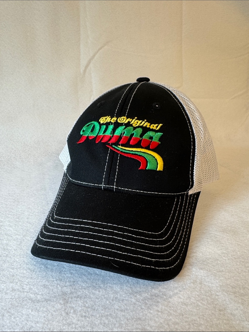 Puma Black and White Trucker Cap with Multicolor Embroidery